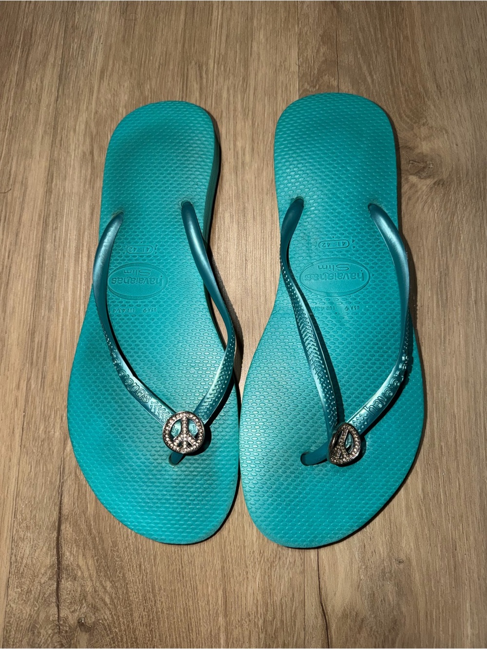 Havaianas Women's Teal Flip Flops with Peace Charm Accent